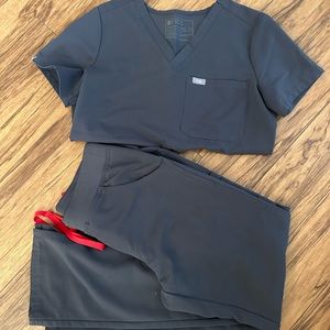 Women’s figs. Charcoal gray with red string.